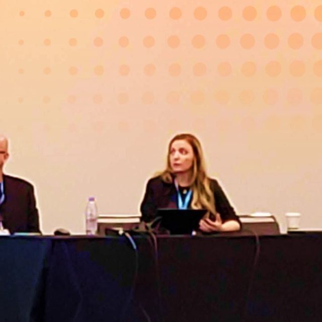 Hollie speaking on a conference panel